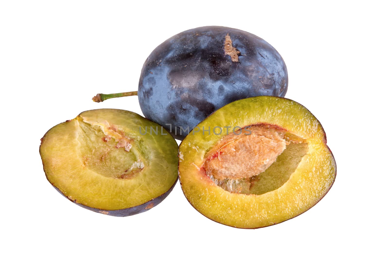 Cut plums isolated on a white background
