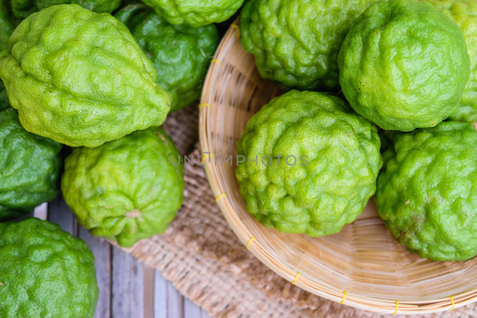 Bergamot on bamboo basket on wooden table