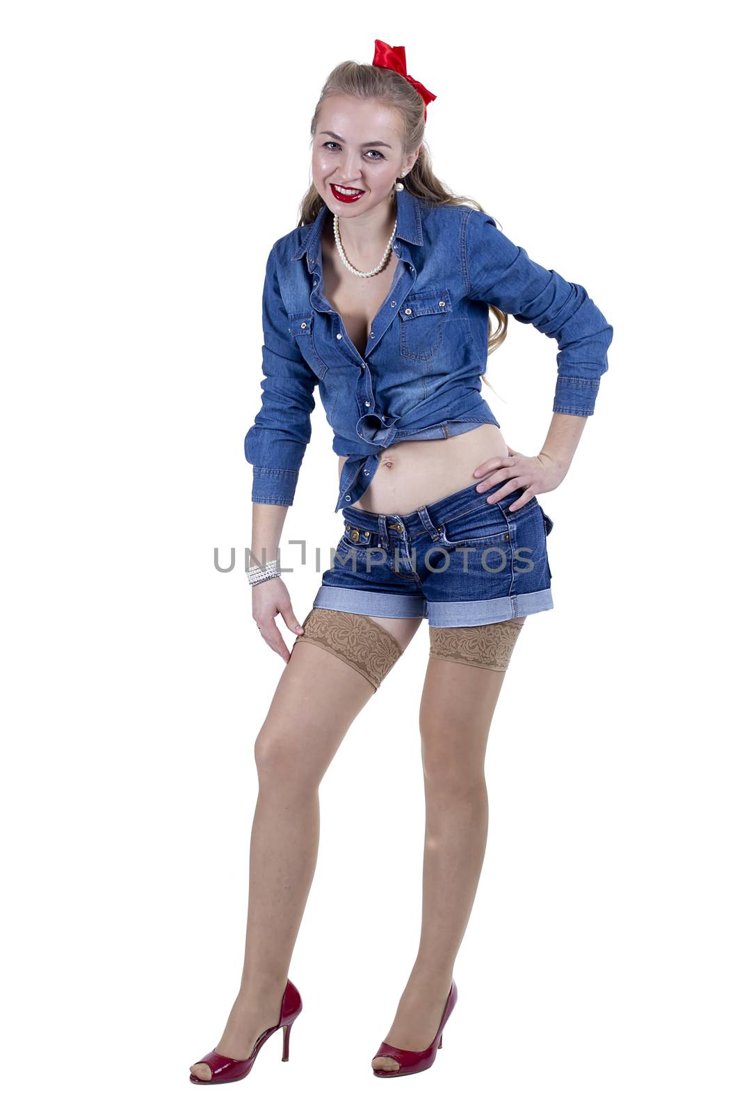 Young beautiful girl in pin-up style on a white background