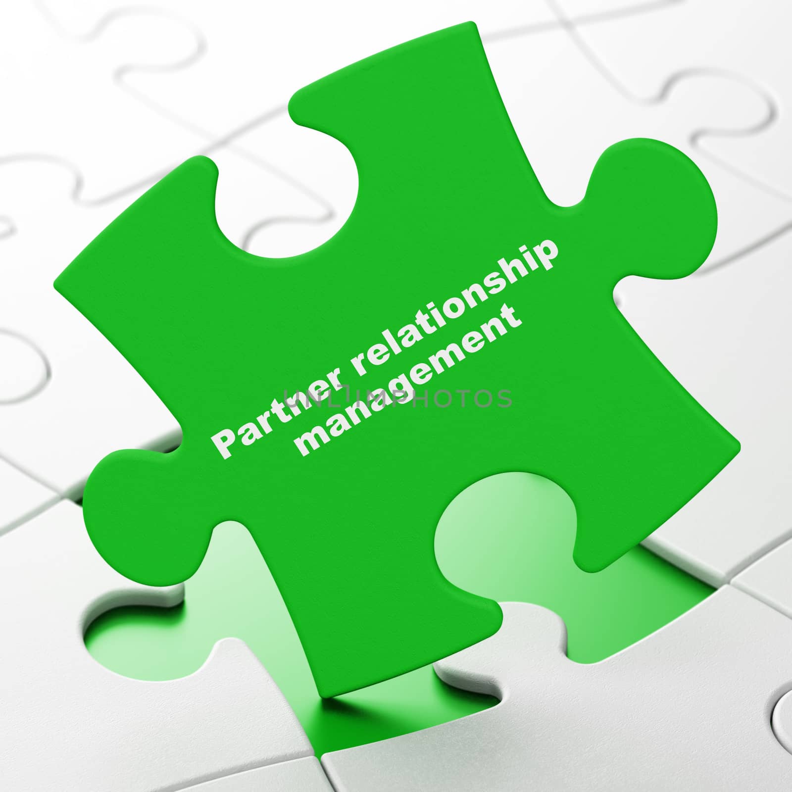 Business concept: Partner Relationship Management on puzzle background by maxkabakov