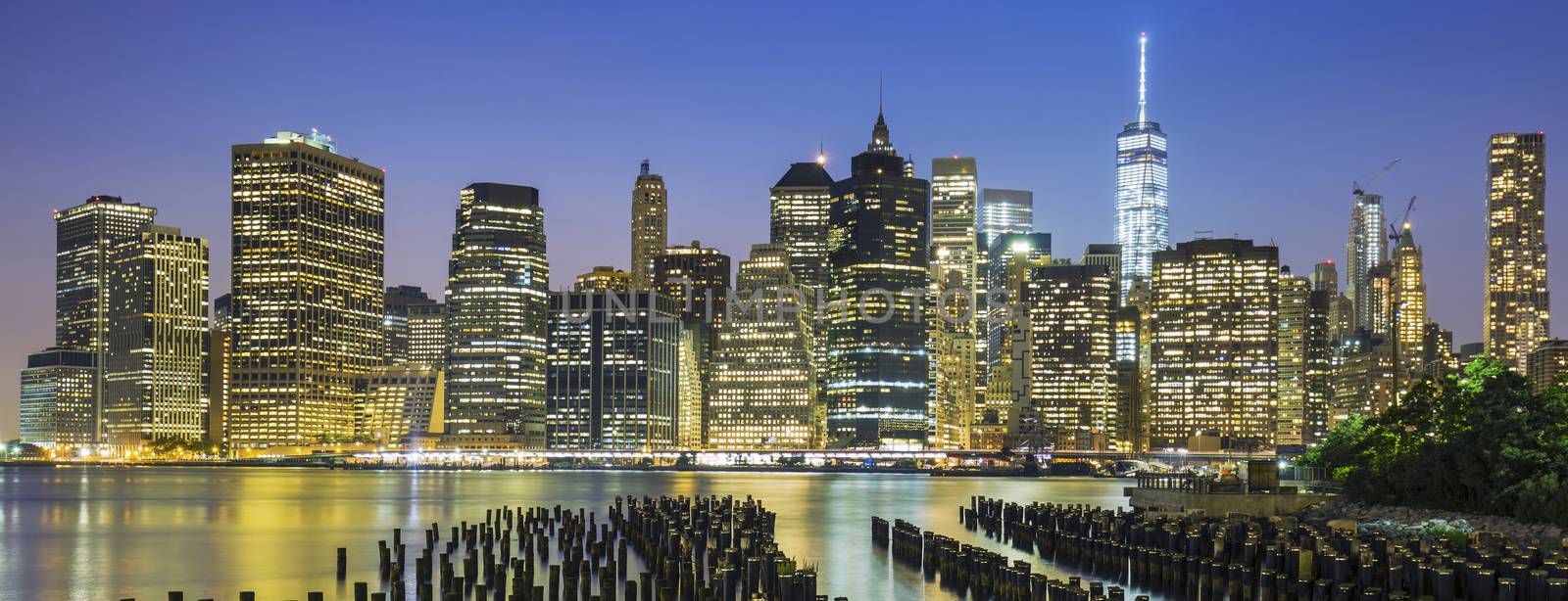 View of New York City Manhattan downtown skyline at dusk, USA. 