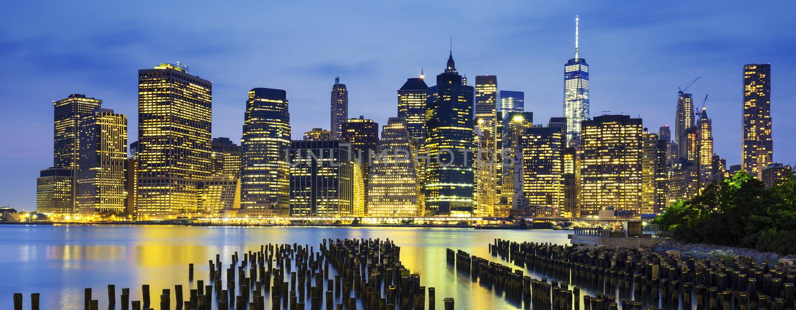 Famous view of New York City Manhattan downtown skyline at dusk, USA. 