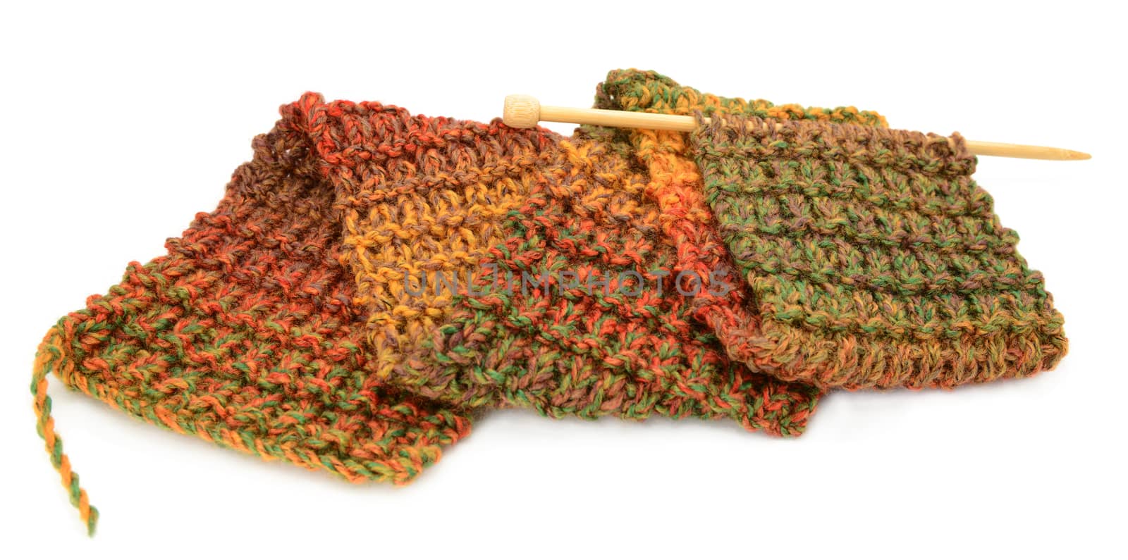 Knitting a scarf in fall colors by sarahdoow