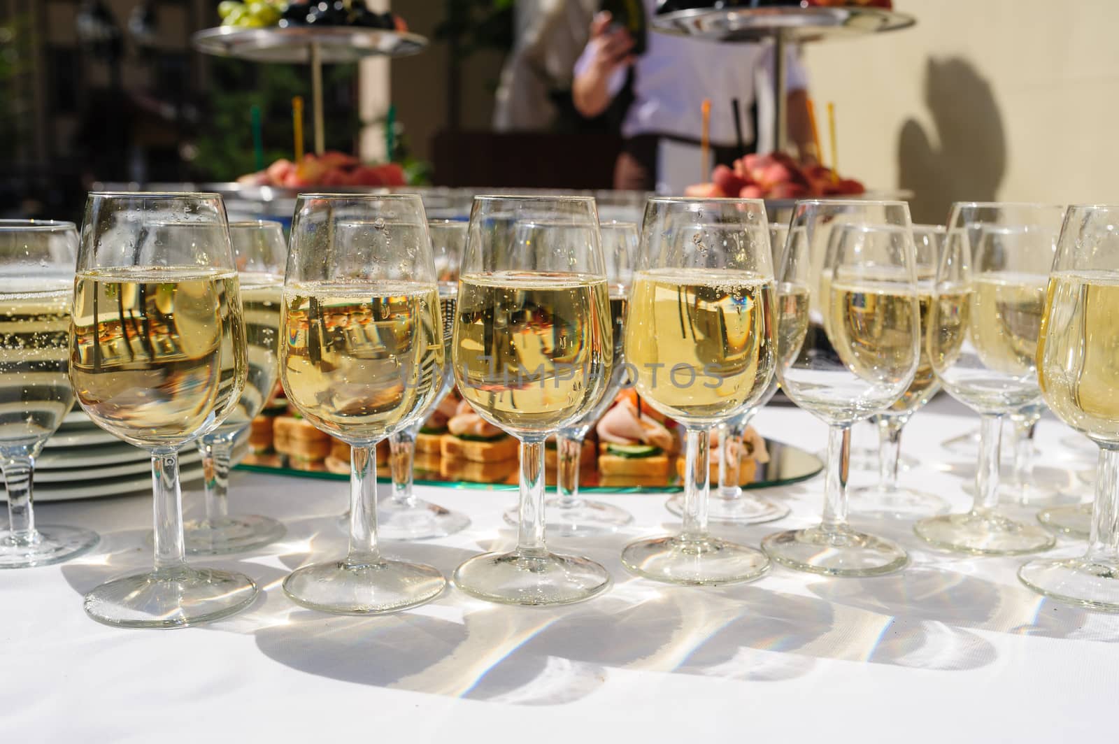 glasses with champagne at the wedding ceremony on table
