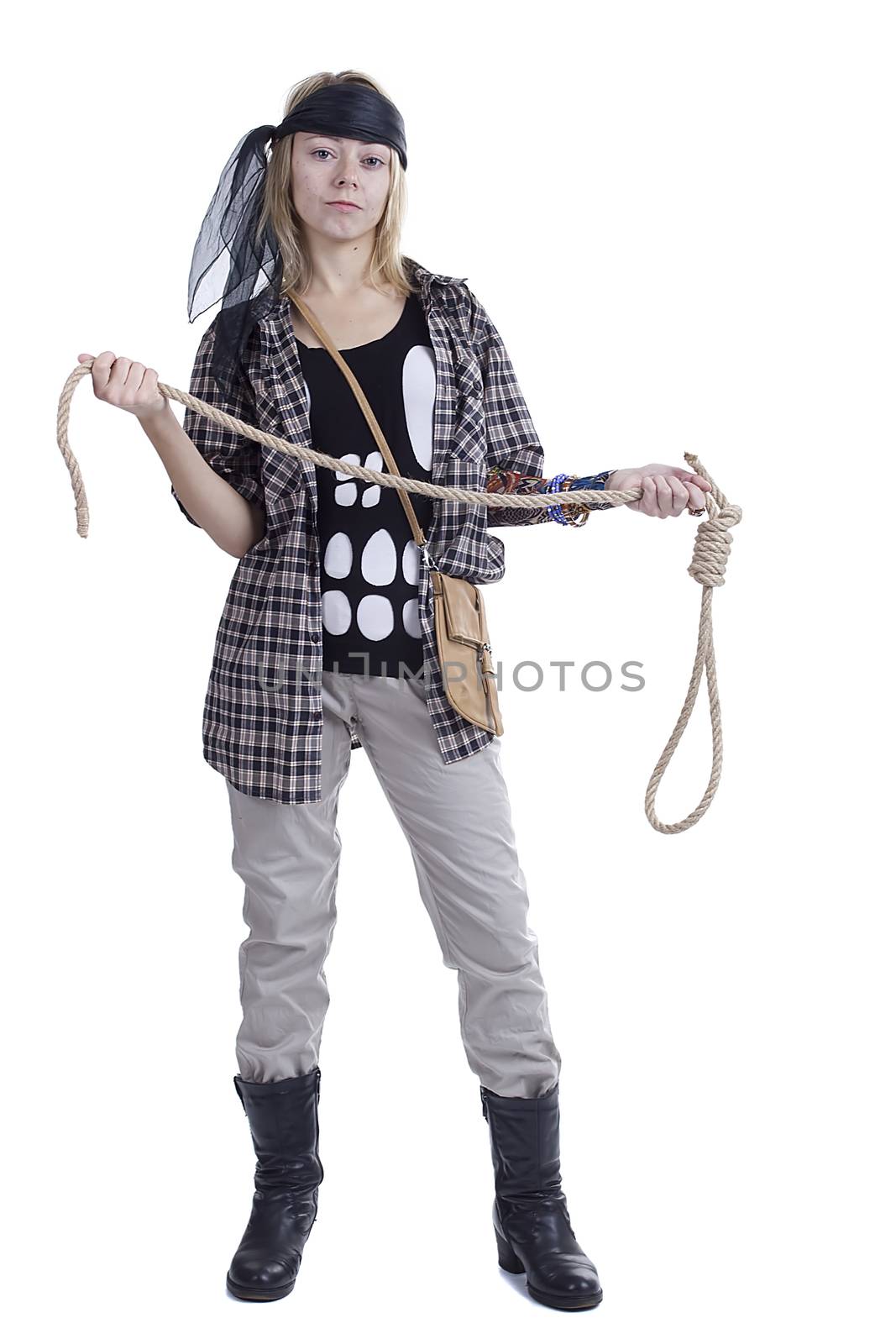 Young woman in the image of a pirate on a white background