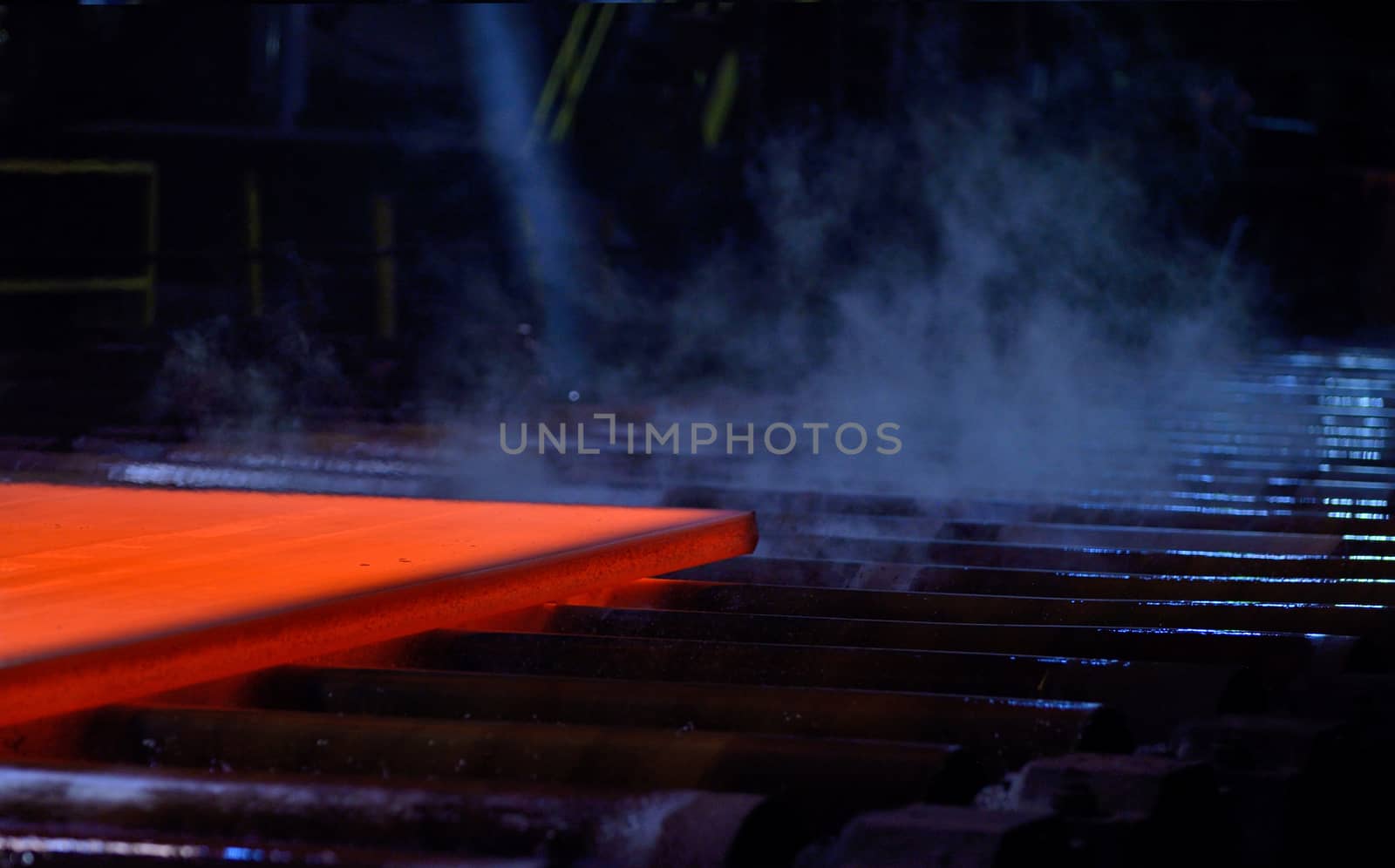 Hot steel plate on conveyor