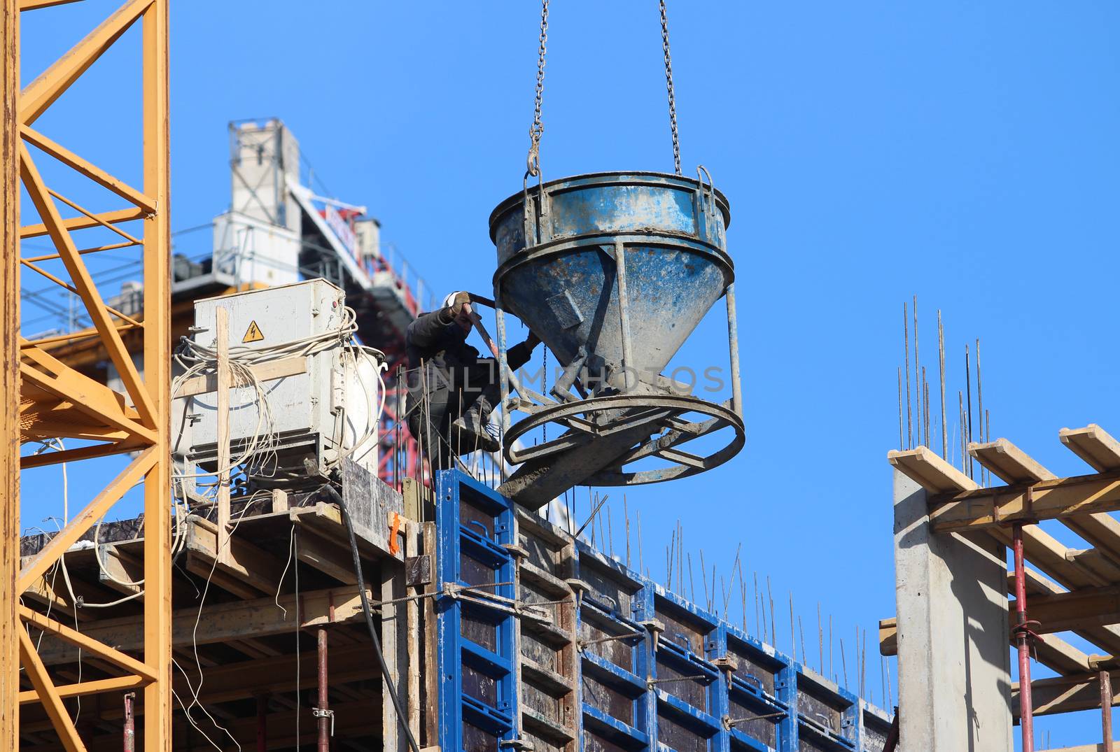 Concrete pouring on the construction of the building