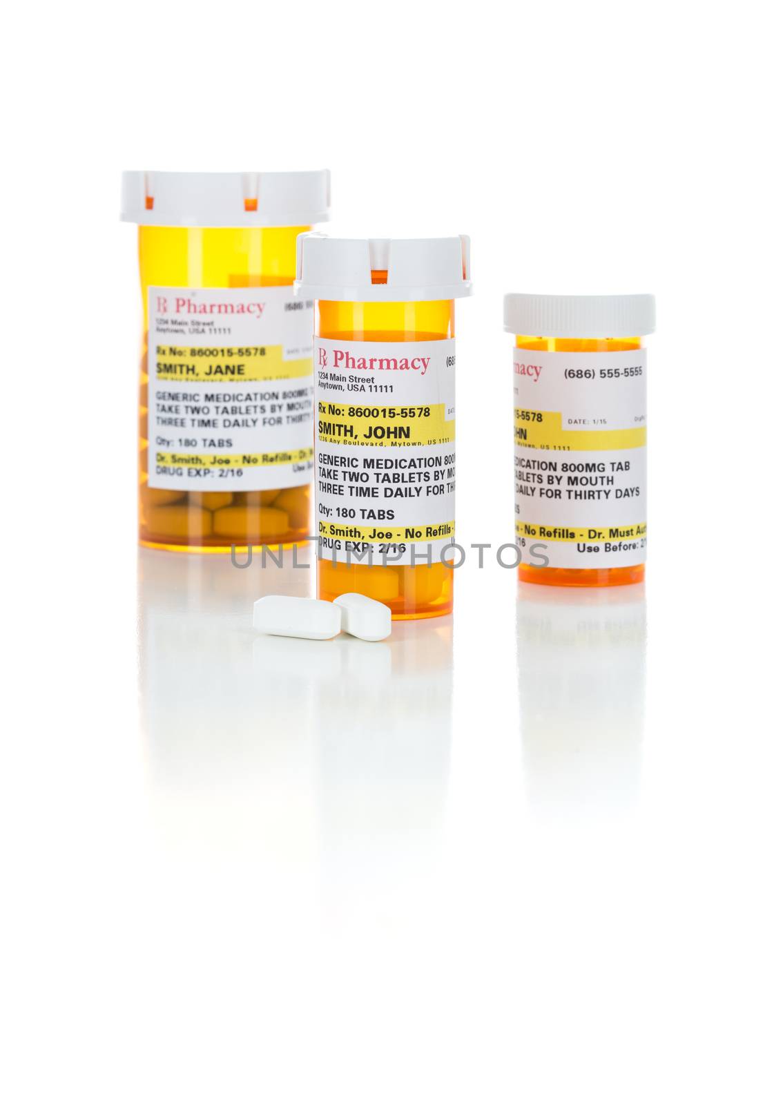 Non-Proprietary Medicine Prescription Bottles and Pills Isolated on a White Background.