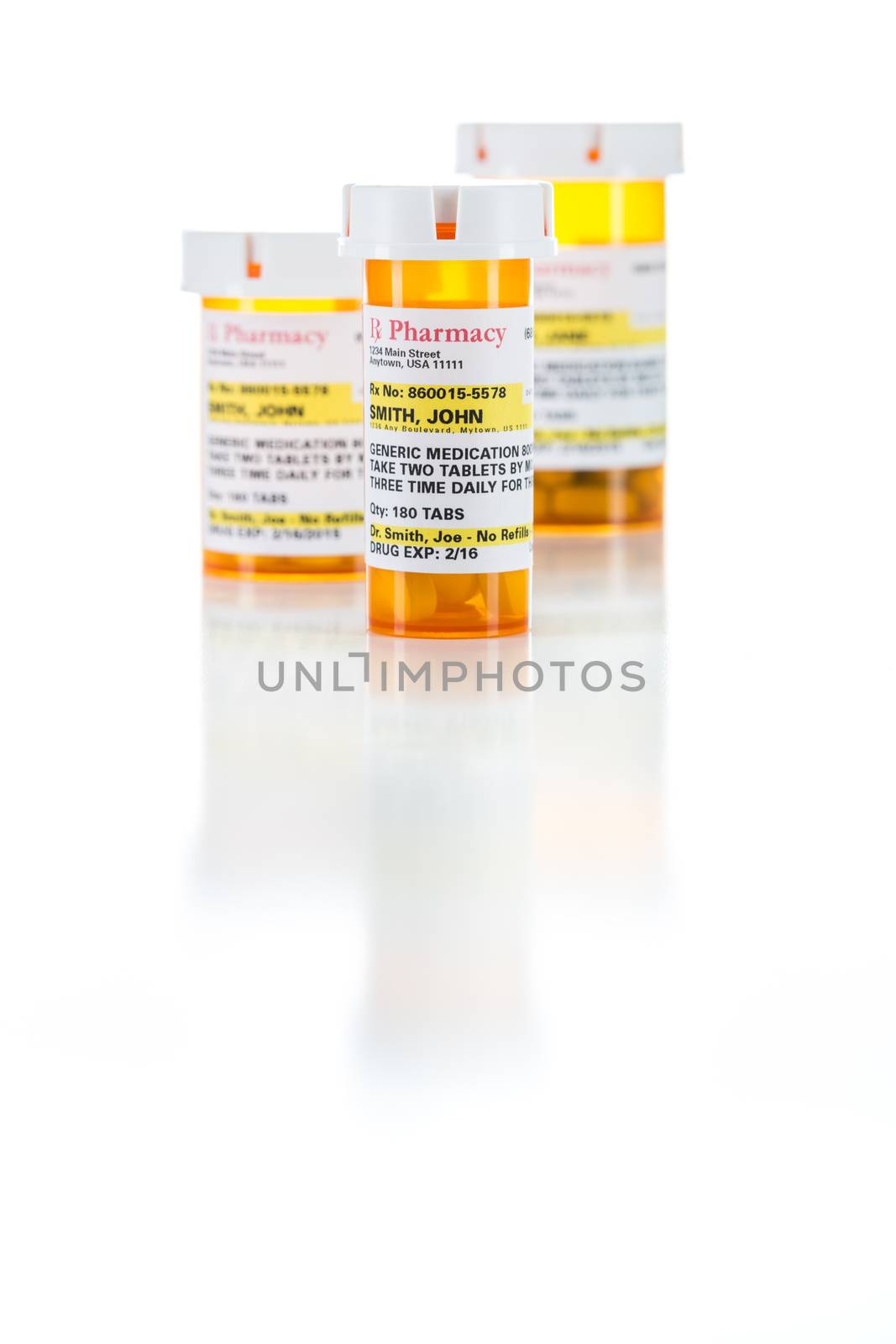 Three Non-Proprietary Medicine Prescription Bottle Isolated on a White Background.