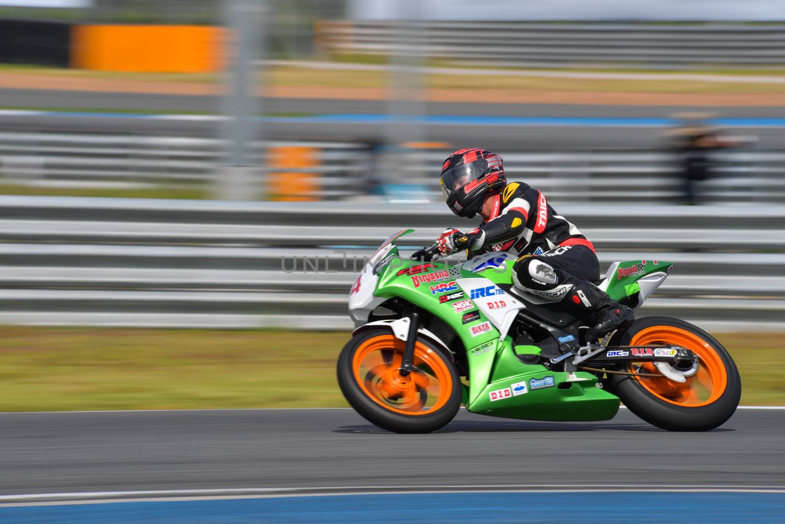 BURIRAM - DECEMBER 4 : THaned Boonruang of Thailand with Honda CBR300R motorcycle of CBR300R Thailand Dream Cup in Asia Road Racing Championship 2016 Round 6 at Chang International Racing Circuit on December 4, 2016, Buriram, Thailand.