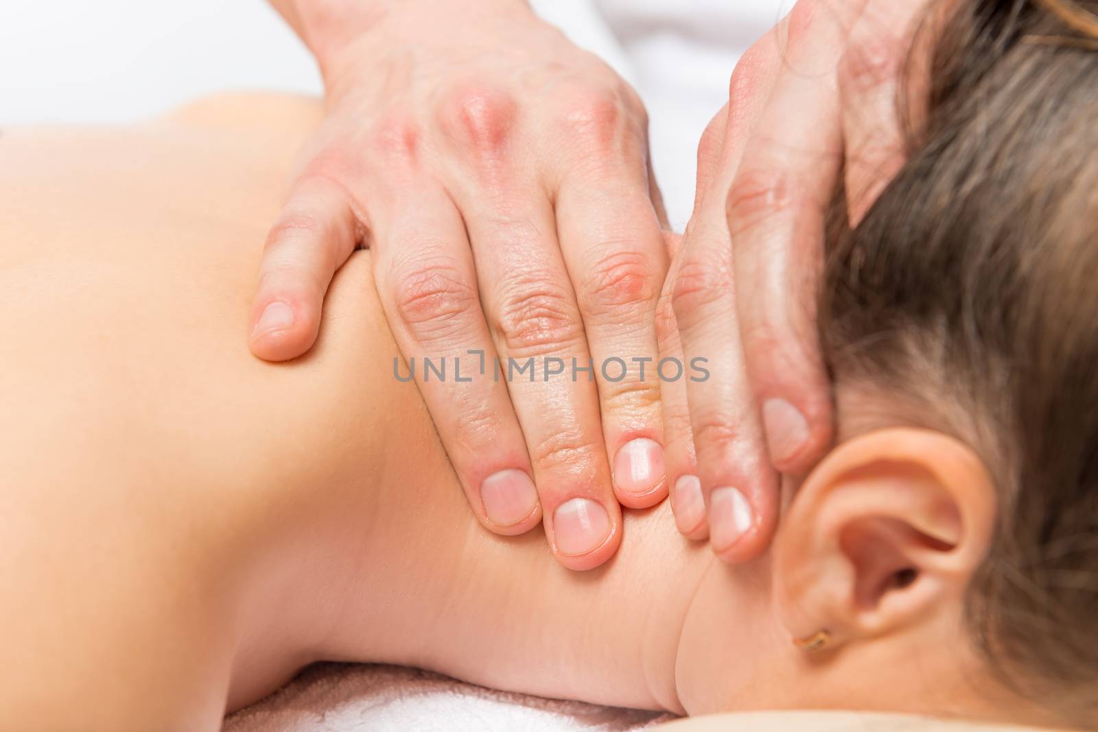 professional neck massage on the massage table