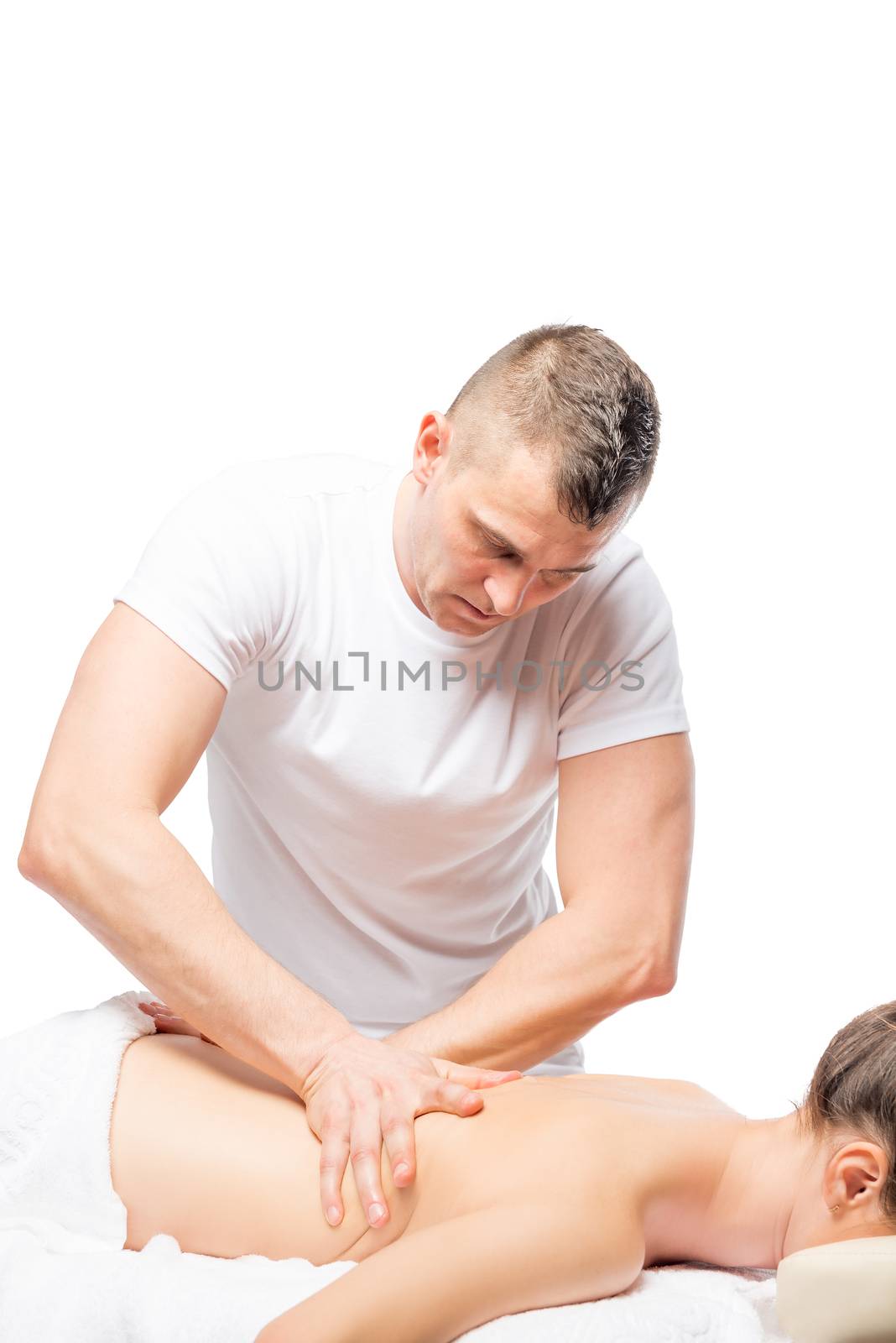 portrait of a professional masseuse at work in isolation