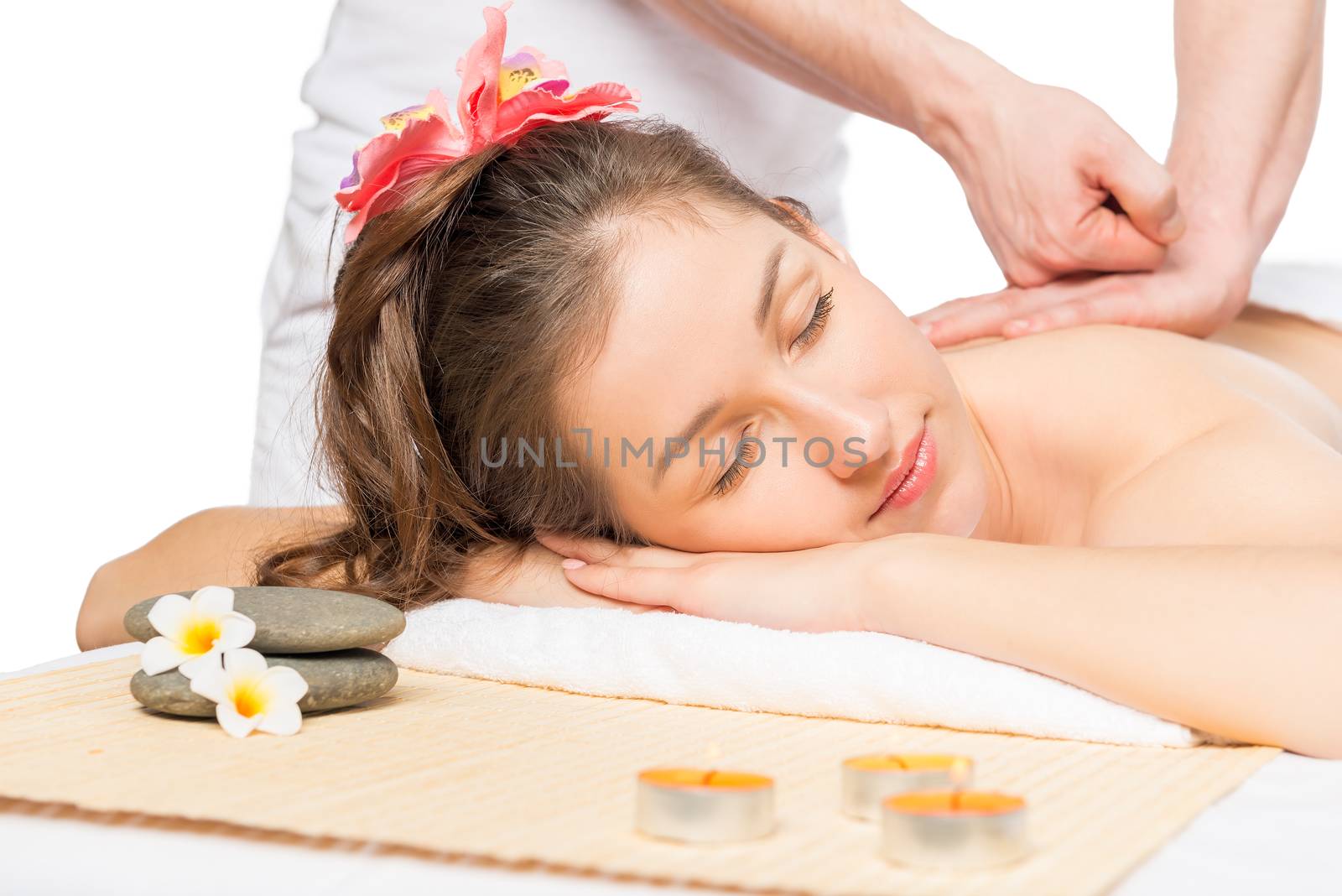 young woman in the spa cabinet with a professional masseur