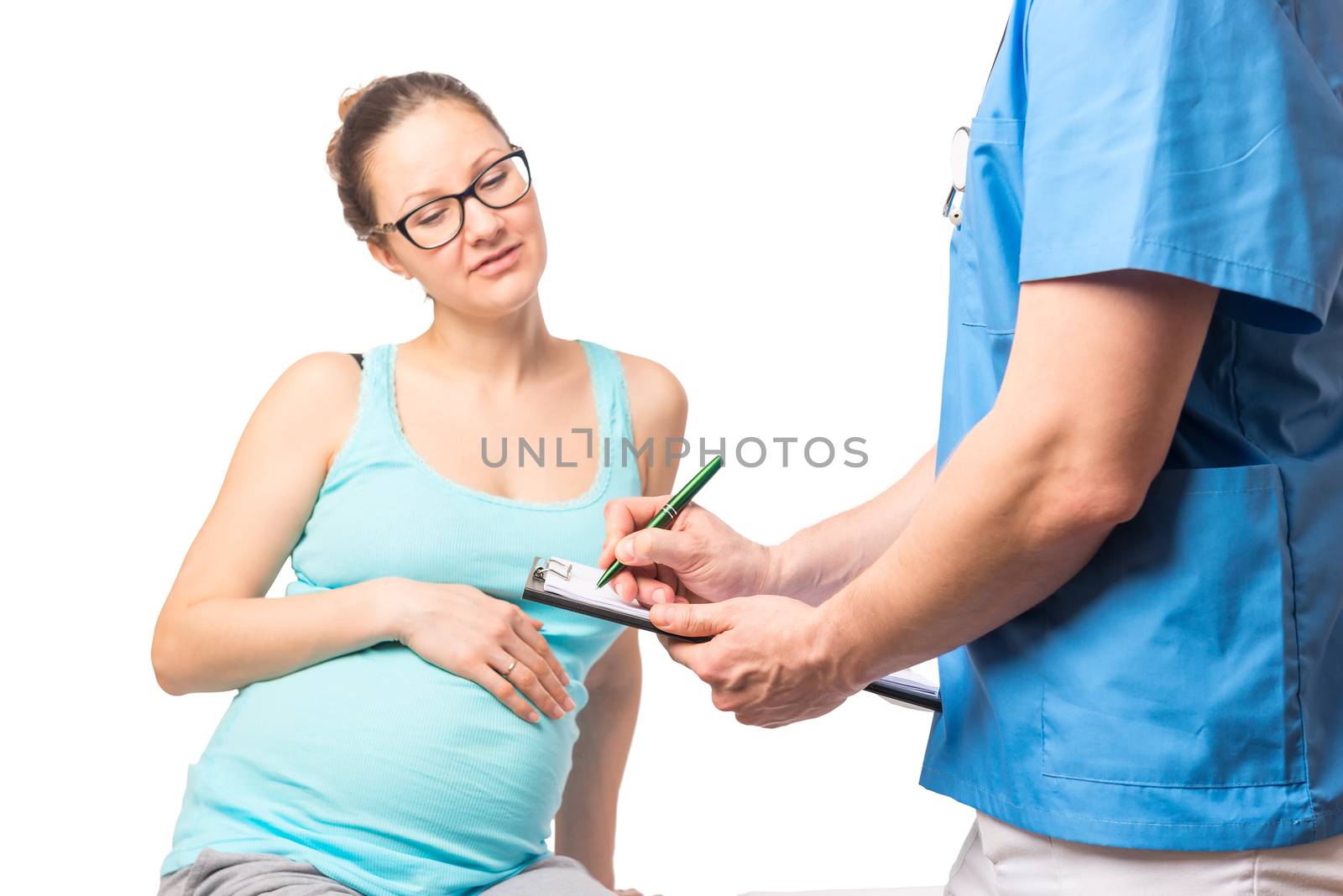 young pregnant woman in doctor's office gynecologist