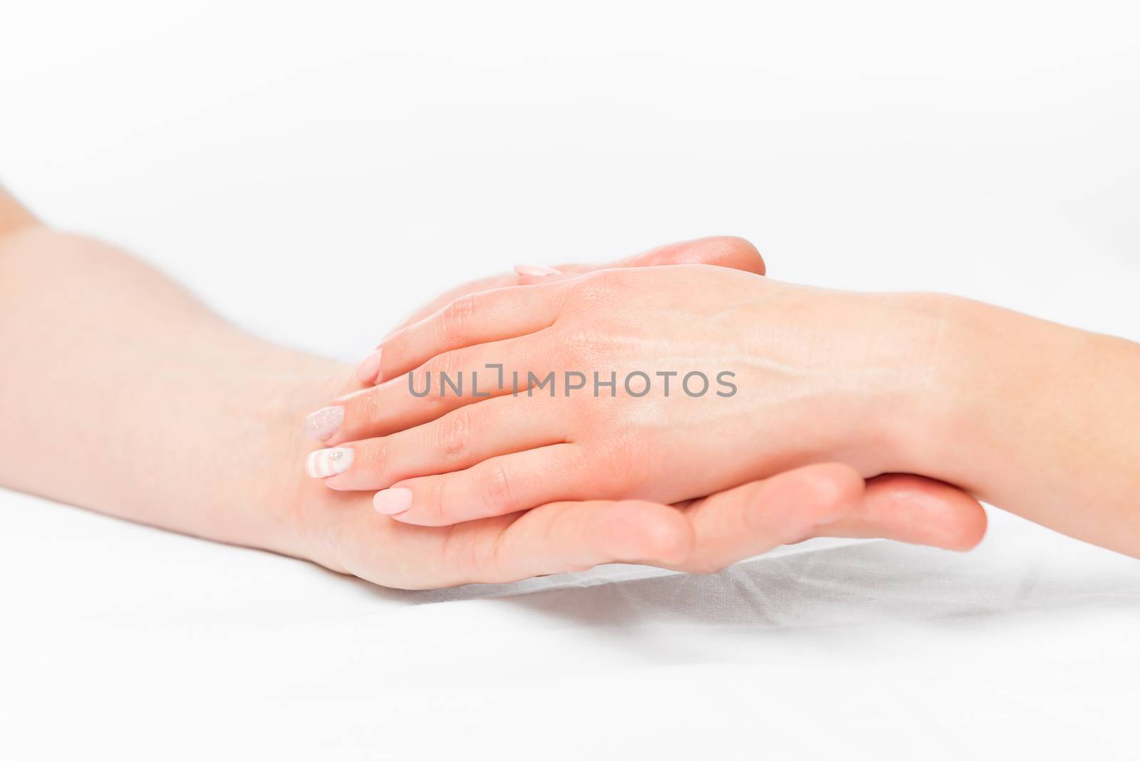 Professional hand massage in salon, close up hands