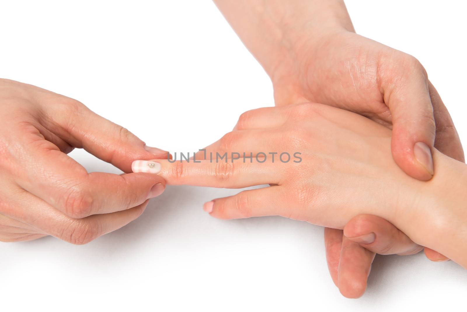 female hands, massage therapist works with the fingers close up