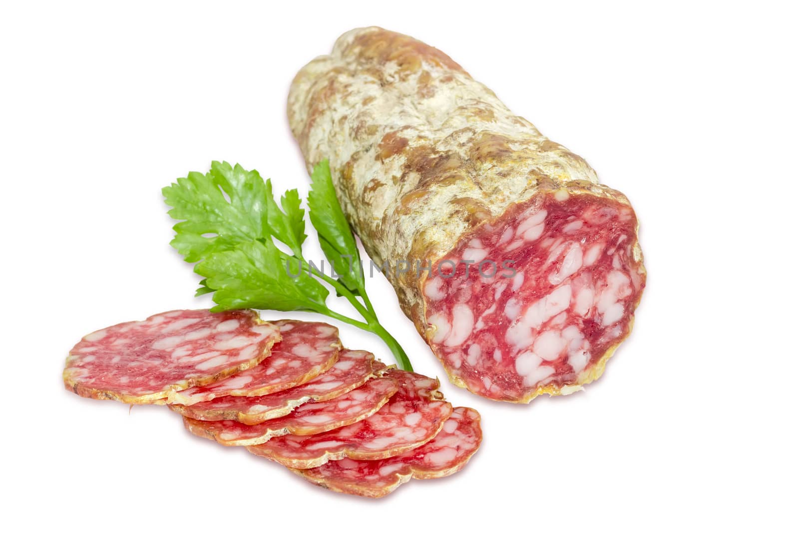 Salami and sprig of parsley  on a light background by anmbph