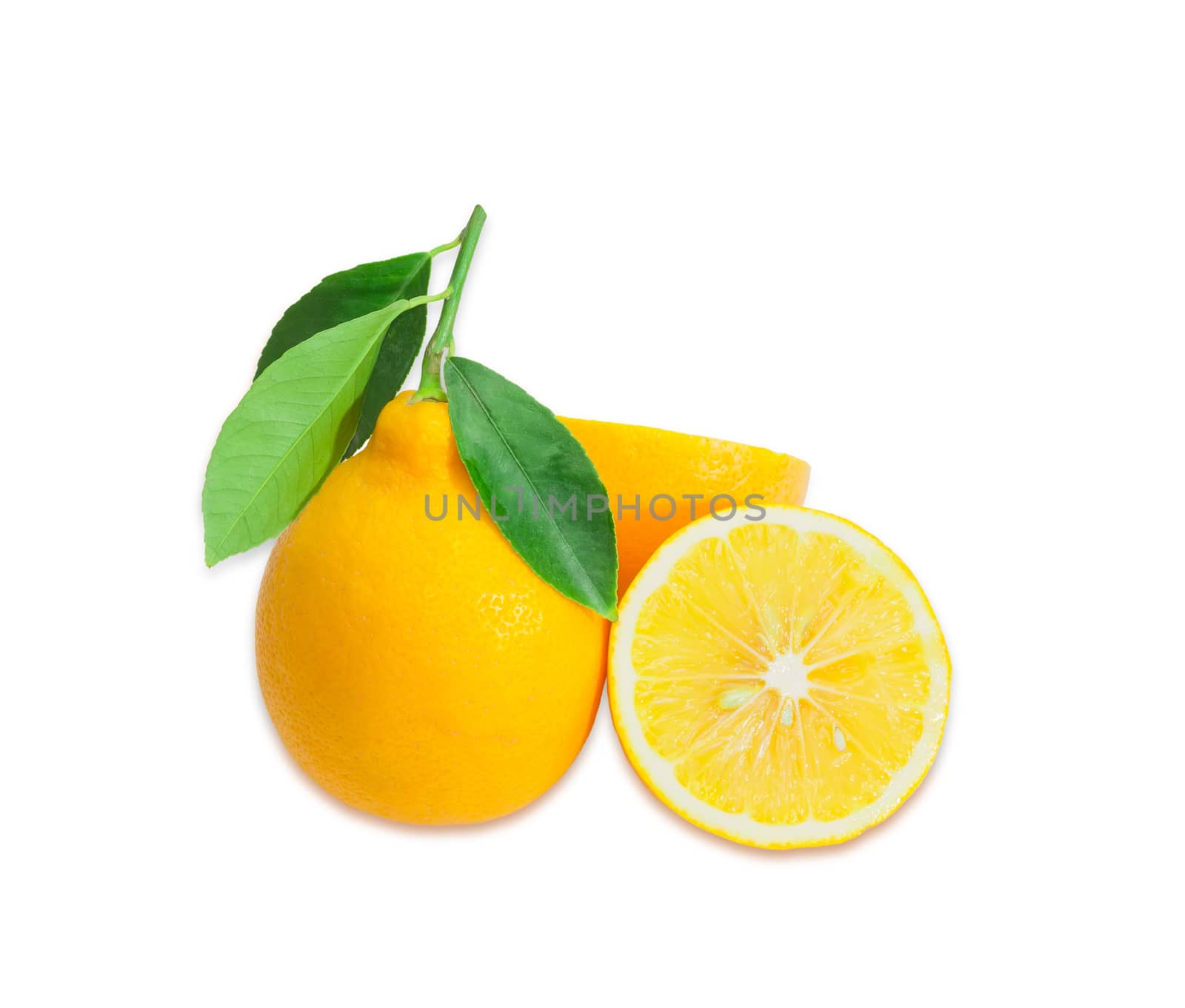 One whole fresh yellow lemon with twig and leaves and one lemon, cut in half on a light background
