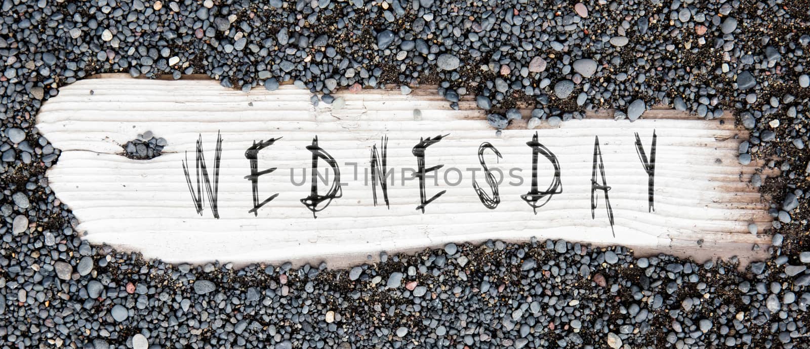 Sand on planked wood, black Icelandic sand - Wednesday