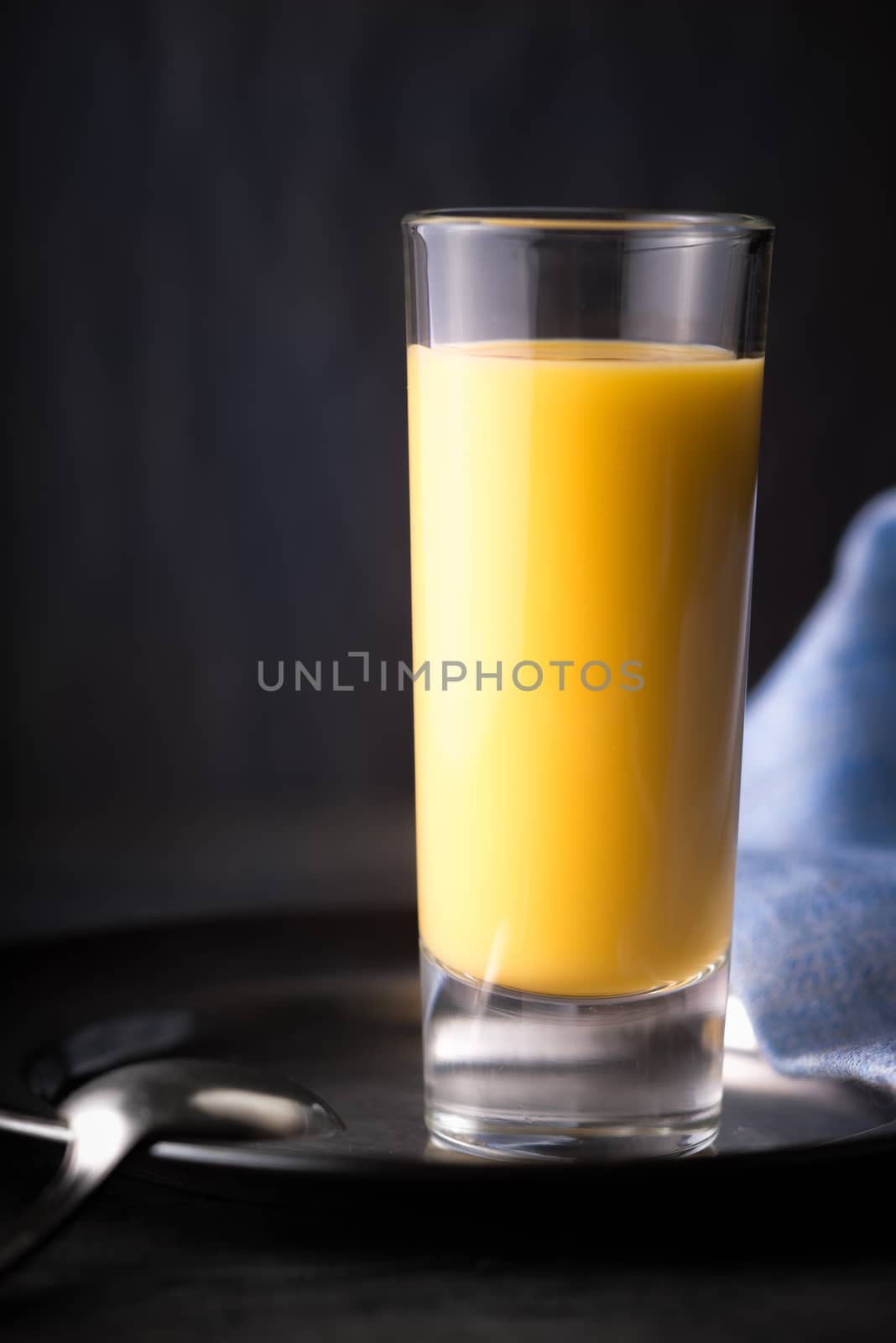 Egg liqueur on the dark background