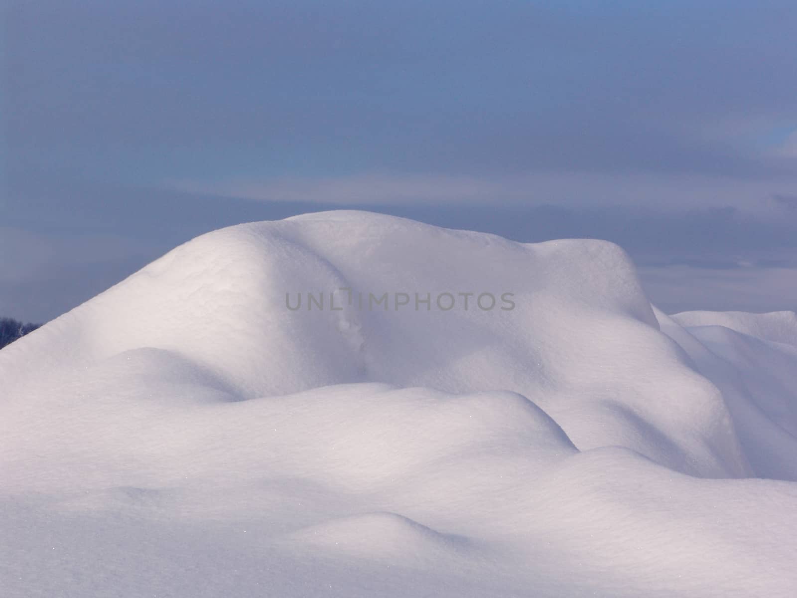 White snowdrift on background blue sky by elena_vz
