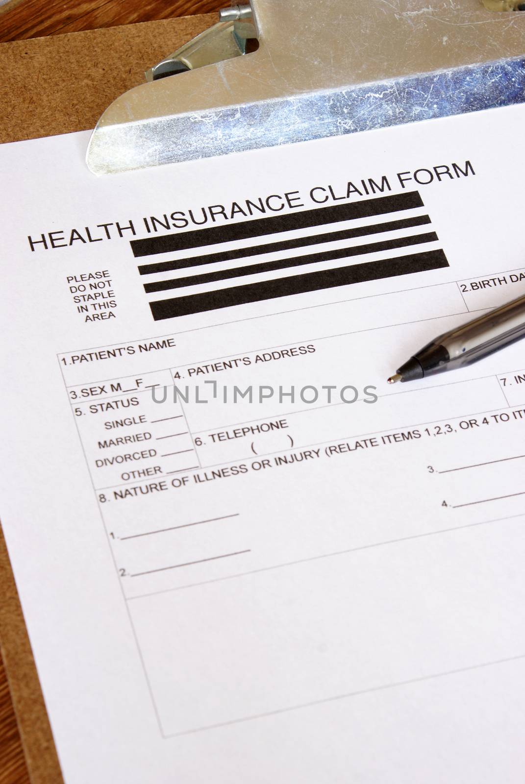 A closeup of a blank health insurance claim form for a patients information.