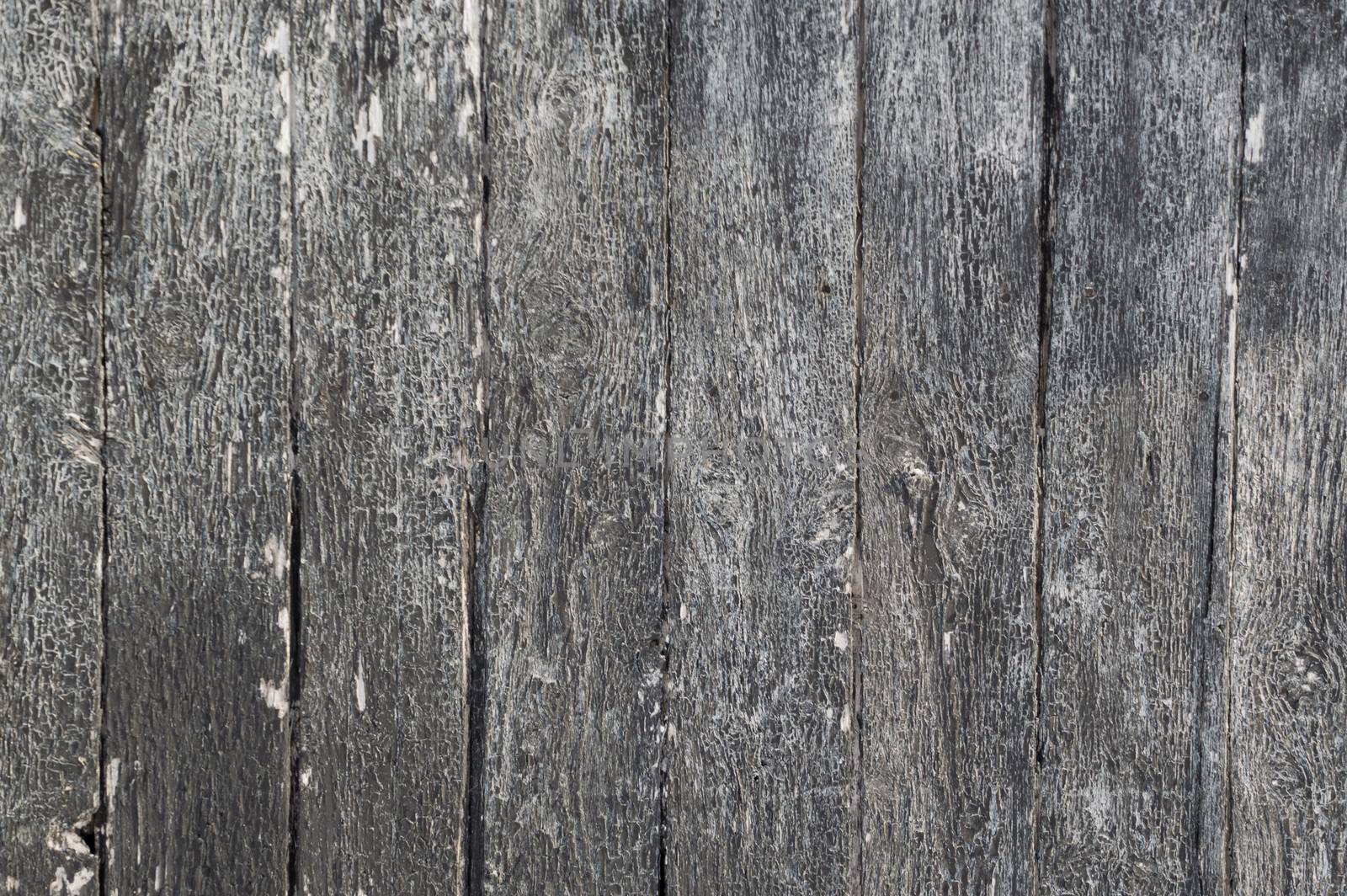 Vertical weathered painted black wooden boards background by Sublimage