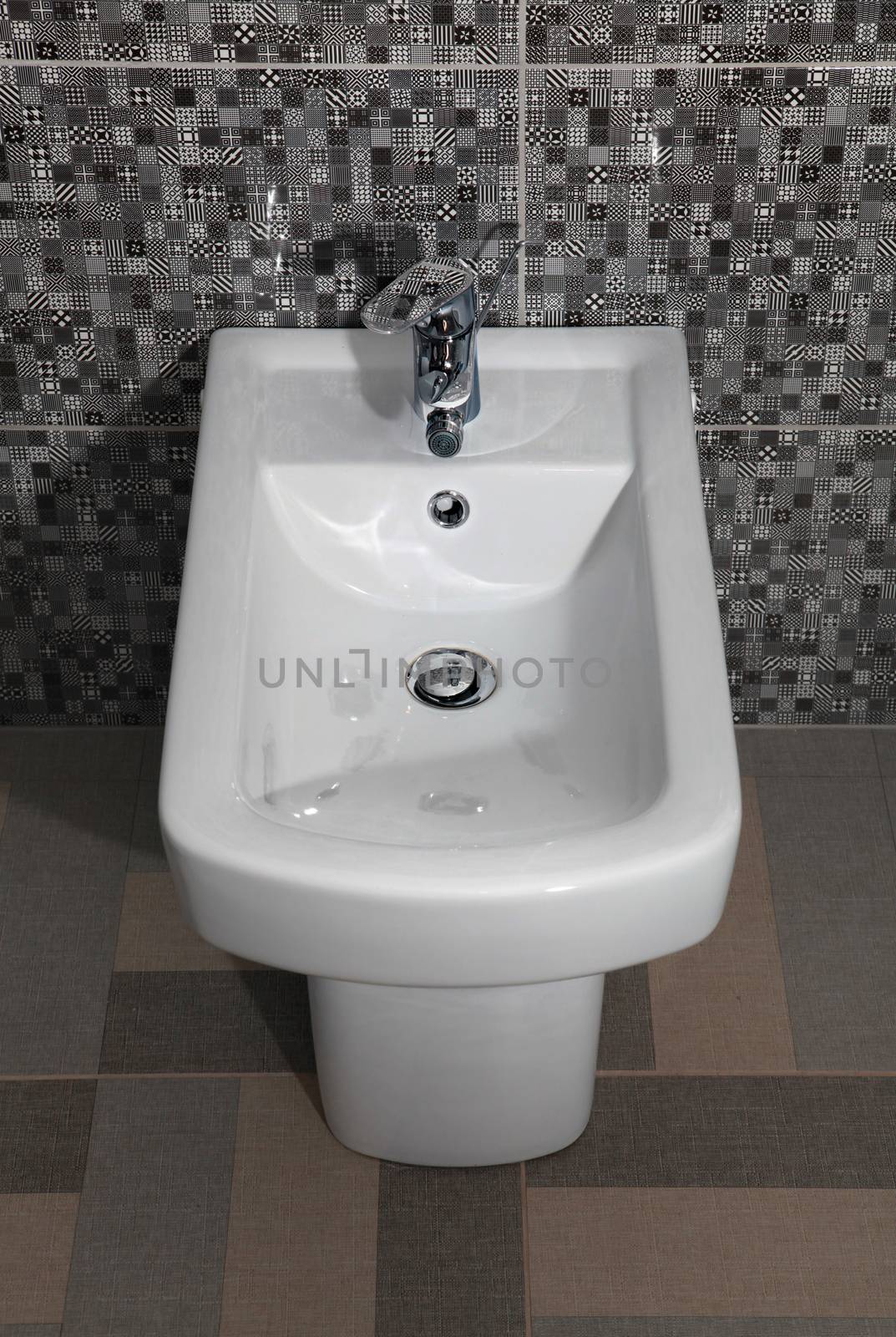 white bidet in a modern bathroom