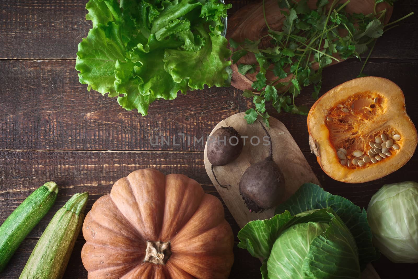 Vegetable mix on the old wooden table top view by Deniskarpenkov