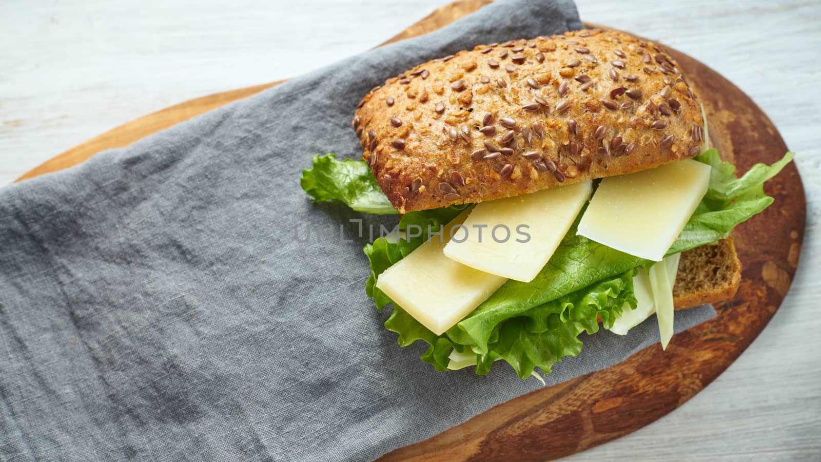 Vegetable sandwich on the wooden board top view