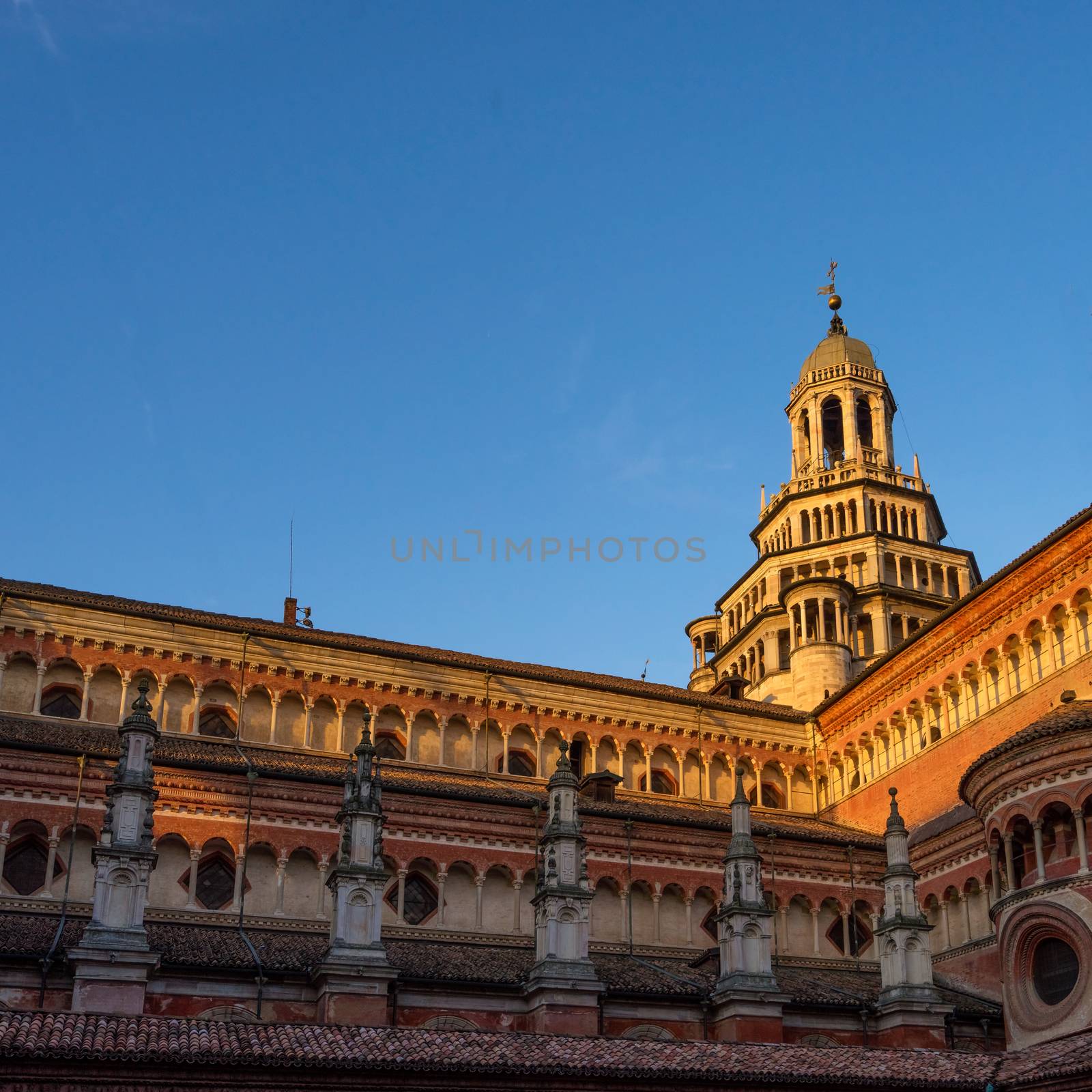 The Pavia Carthusian monastery is an important example of renaissance religious architecture,Italy at sunset,square photo with copy space.