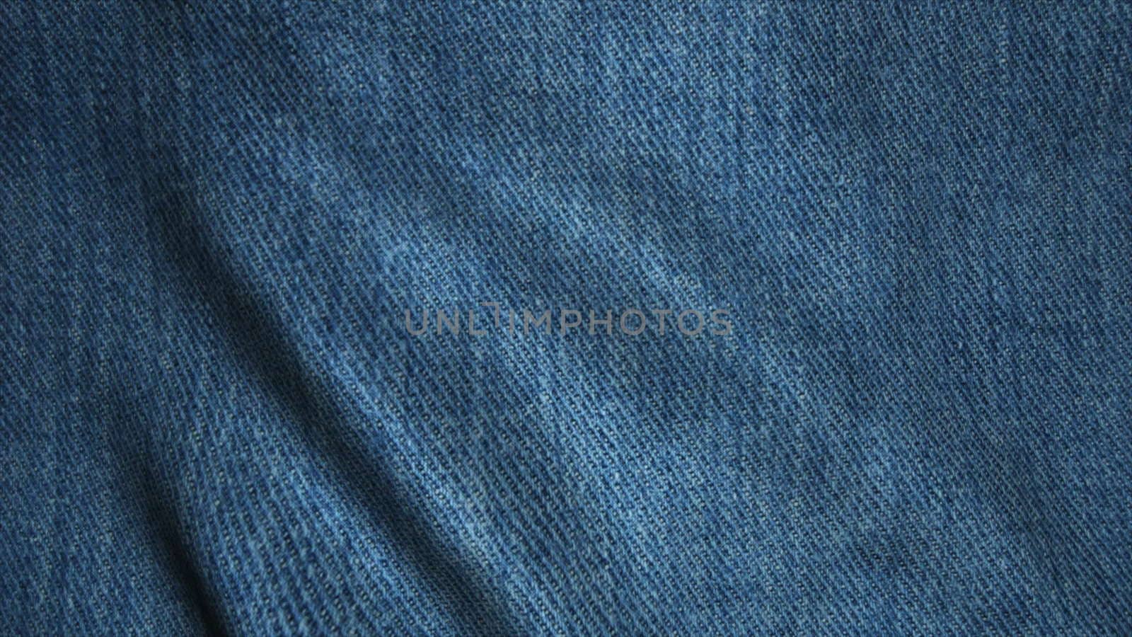 Realistic Ultra-HD jeans cloth waving in the wind. Seamless loop with highly detailed fabric texture by nolimit046