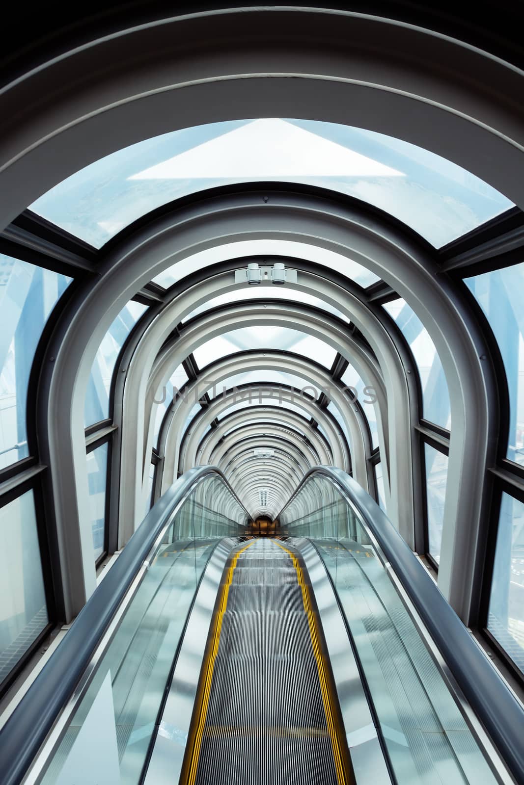 escalator in modern building by zhu_zhu