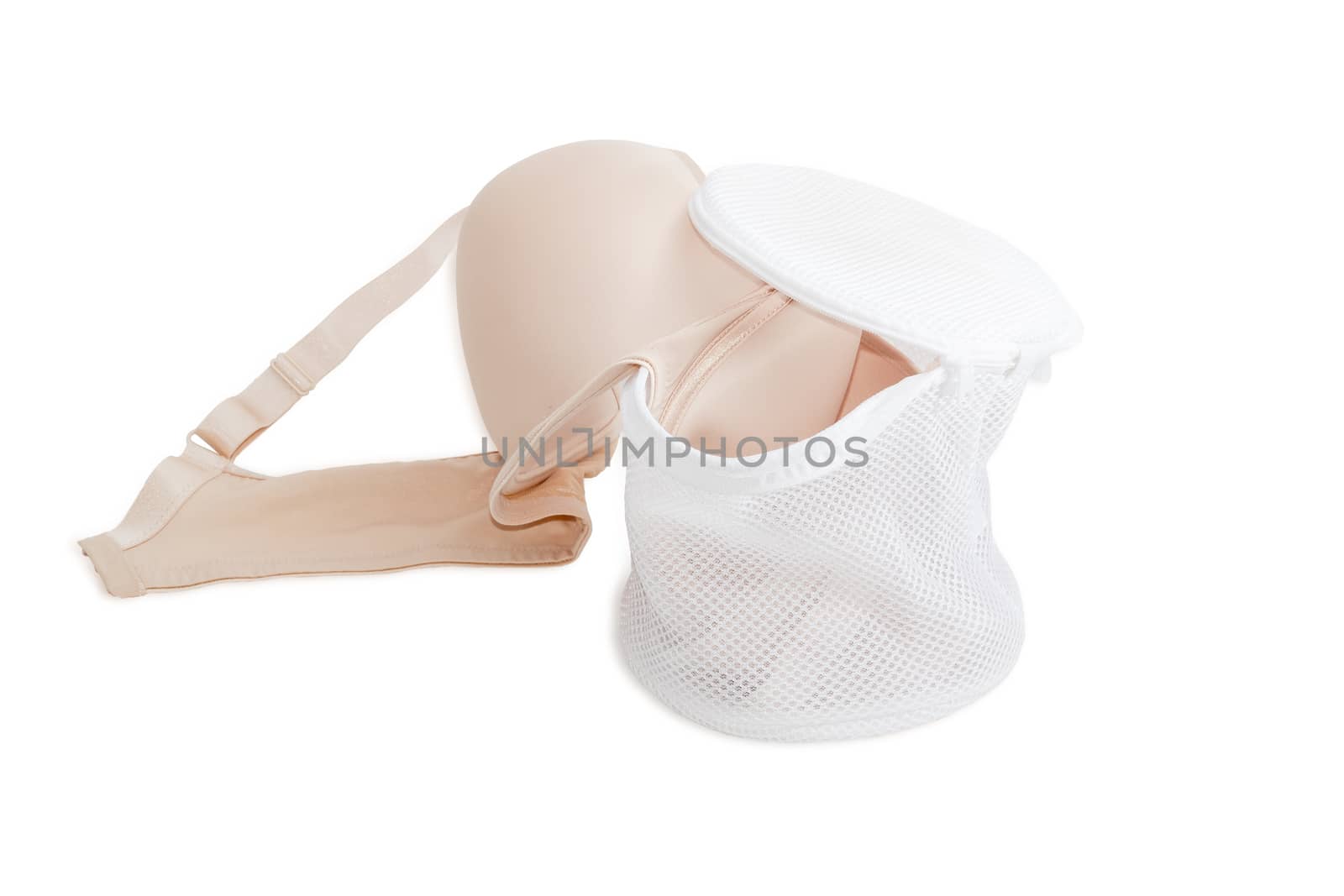 Special laundry bag for washing bras in washing machine on a light background
