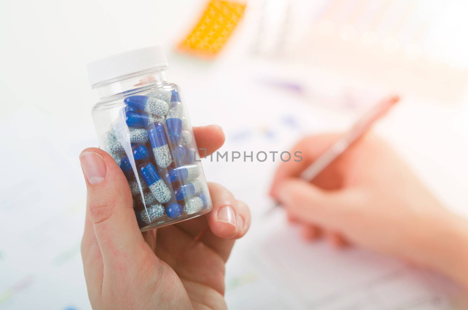 Doctor prescribes pills. pill doctor prescription bottle capsule recipe medicine pharmacist concept