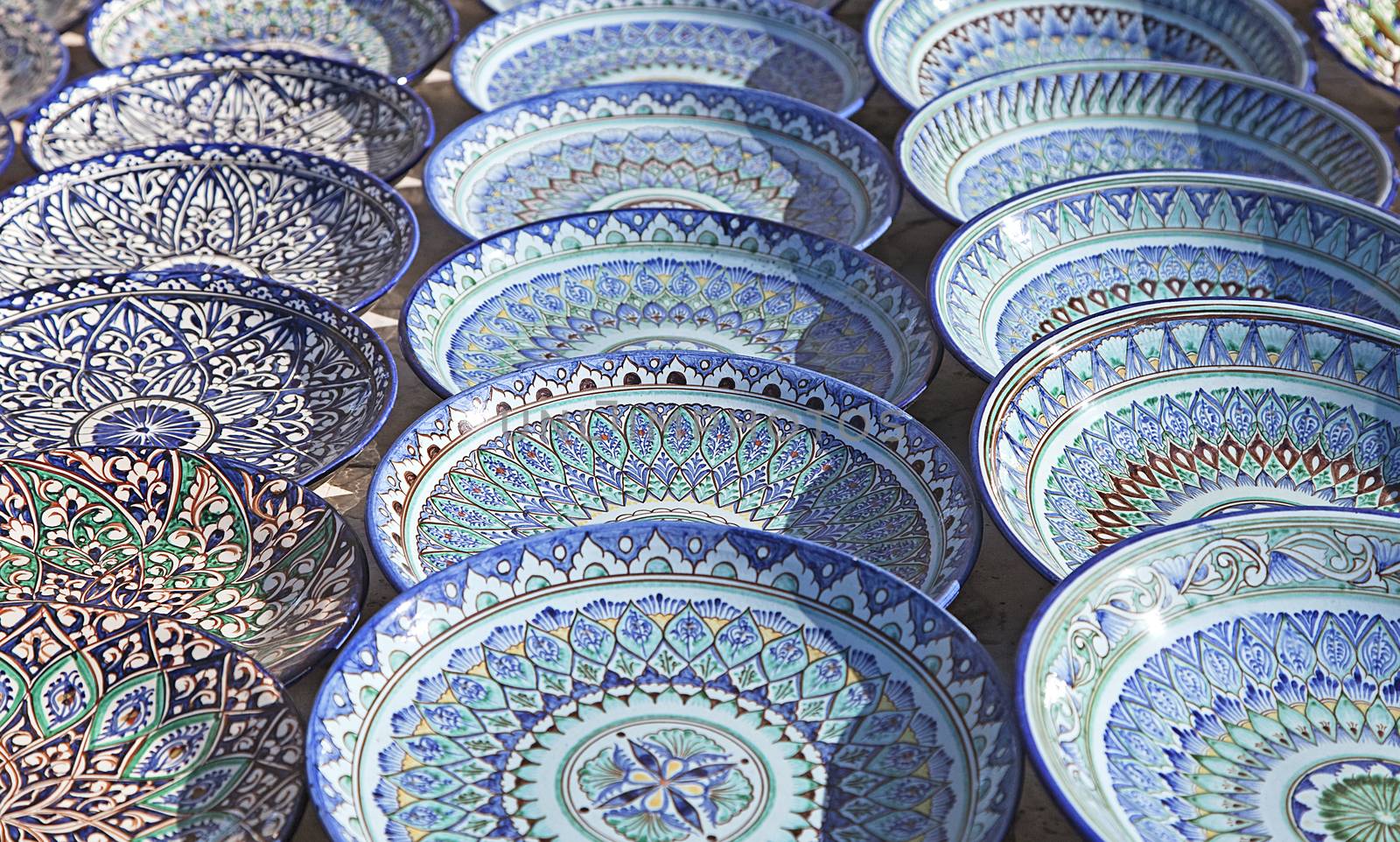 Traditional ceramic dishware in a street market, Uzbekistan