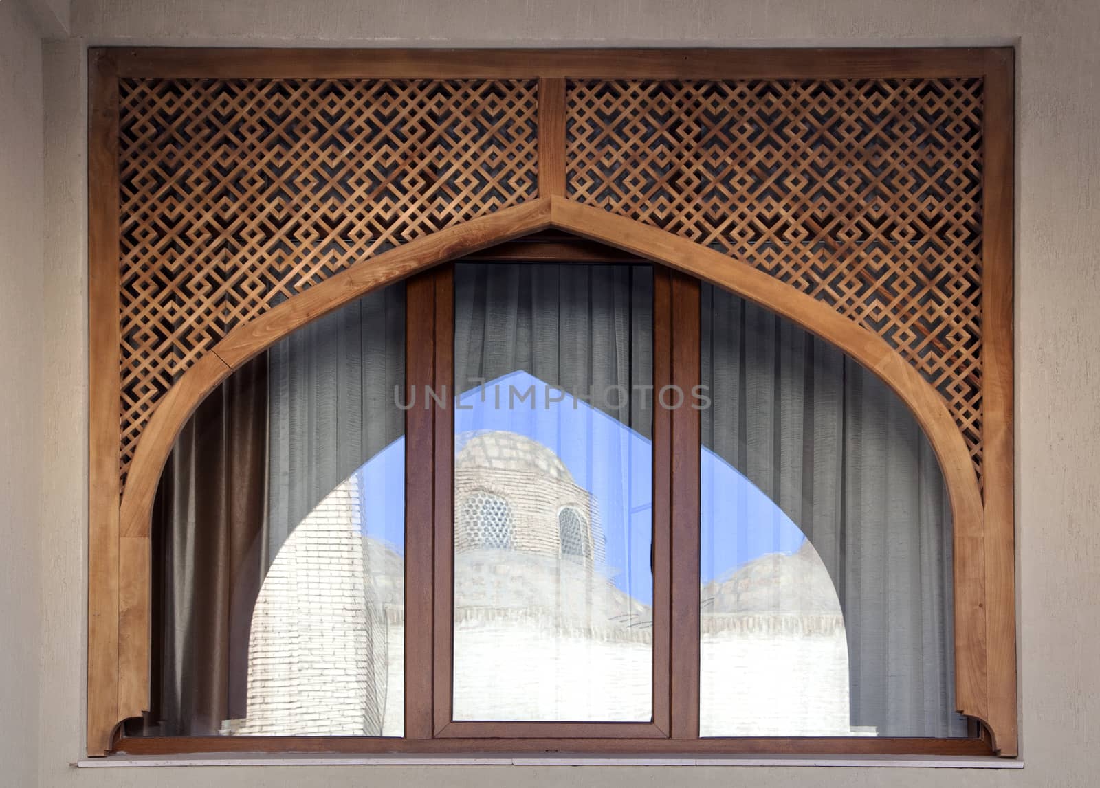 Typical open-work window of an ancient building, Uzbekistan