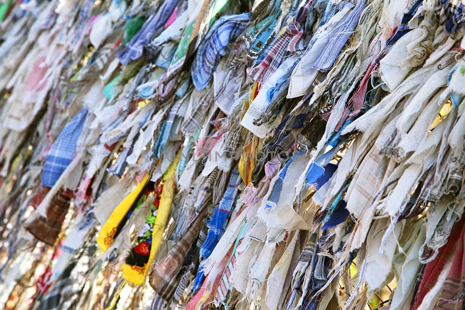 Close up of lots of Buddhist ribbons fluttering in the wind