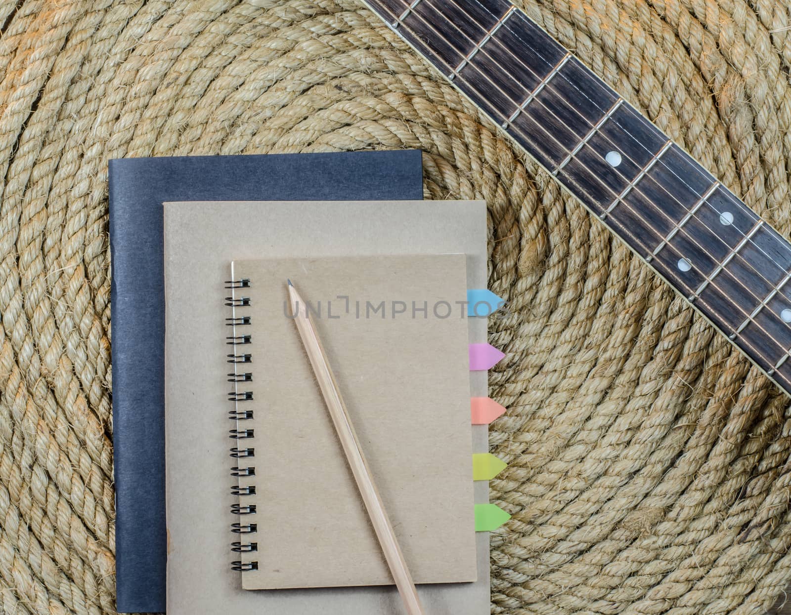 Notebook on a jute rope background by metal22