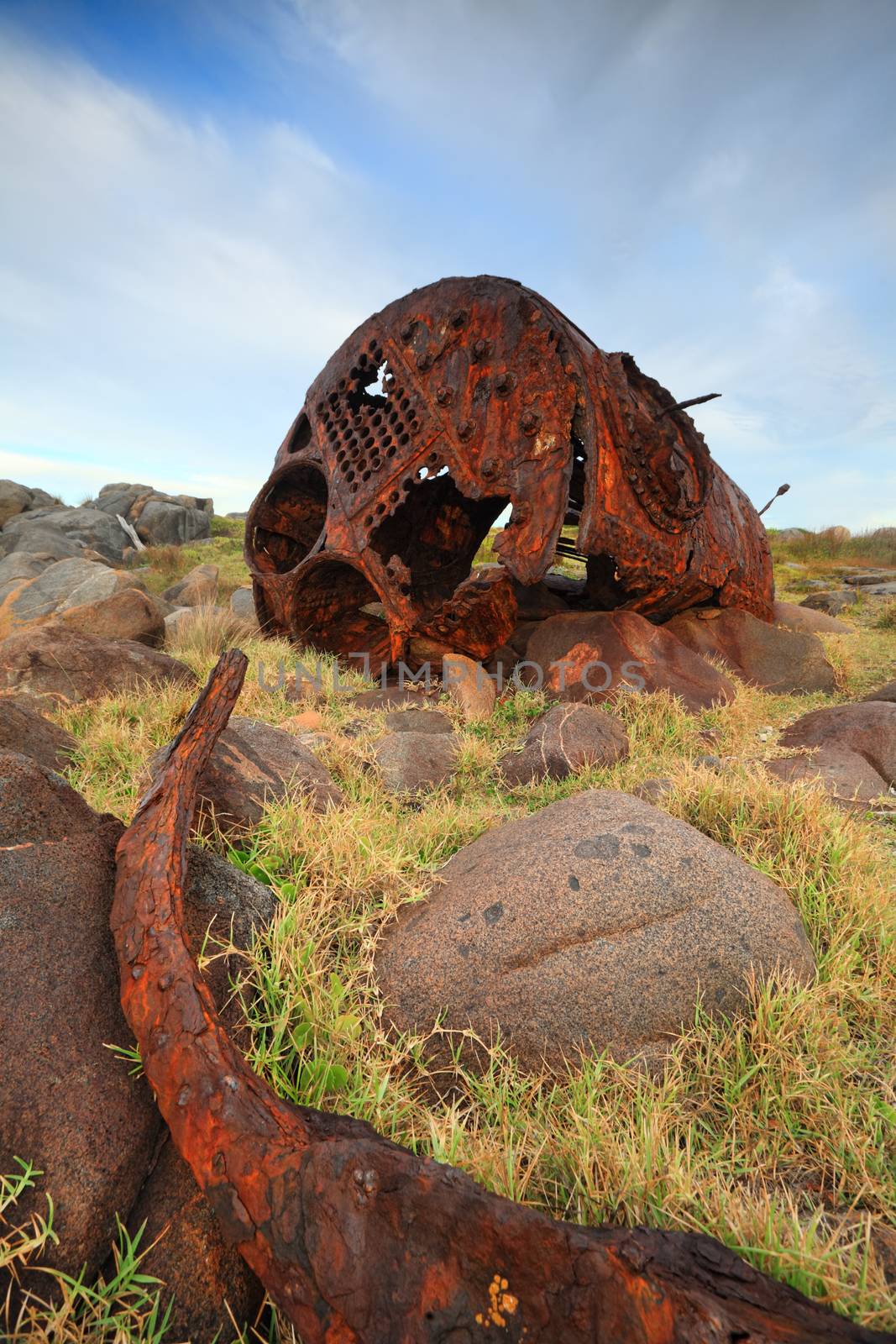 Rusting remains of the old shipwreck, The SS Monaro at Kellys Point, a reminder of the power of the ocean and elements of nature. shipwrecked 1879
