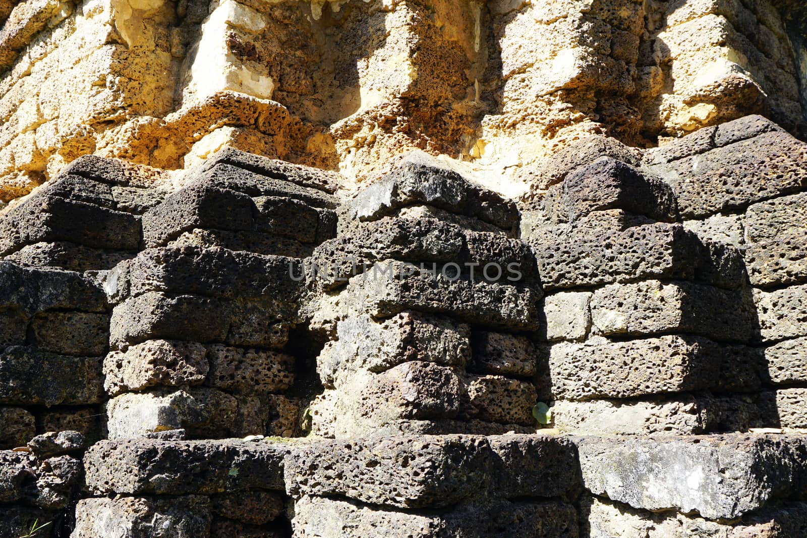 Recess wood twelve base laterite stone shadow light at temple in Sukhothai