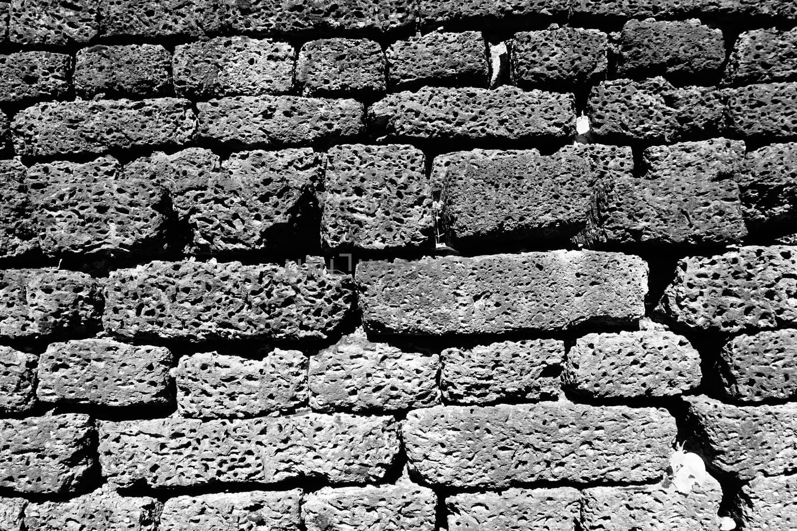 laterite stone material monochrome at temple in Sukhothai world heritage