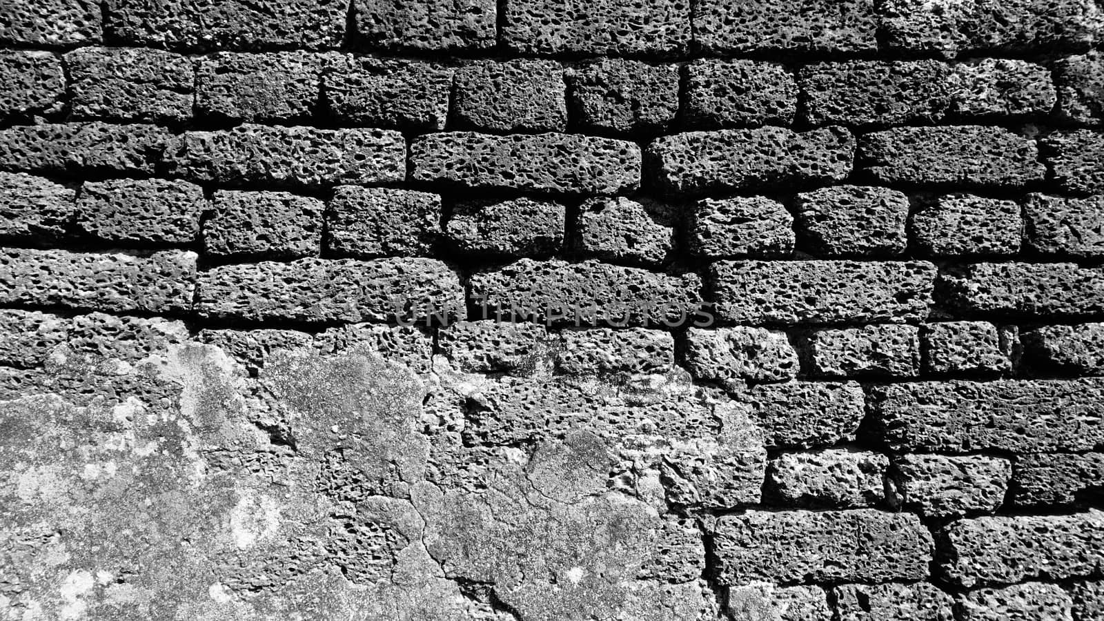 laterite stone material monochrome at temple in Sukhothai world heritage