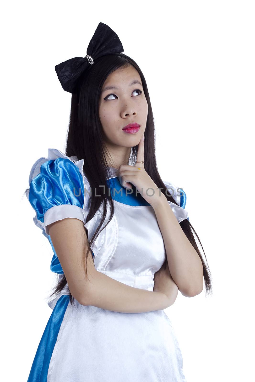 Young girl in the image of Alice on a white background