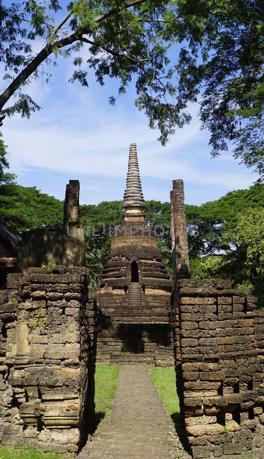 Main approach to Historical Pagoda Wat Nang phaya temple in Sukhothai world heritage Historical park
