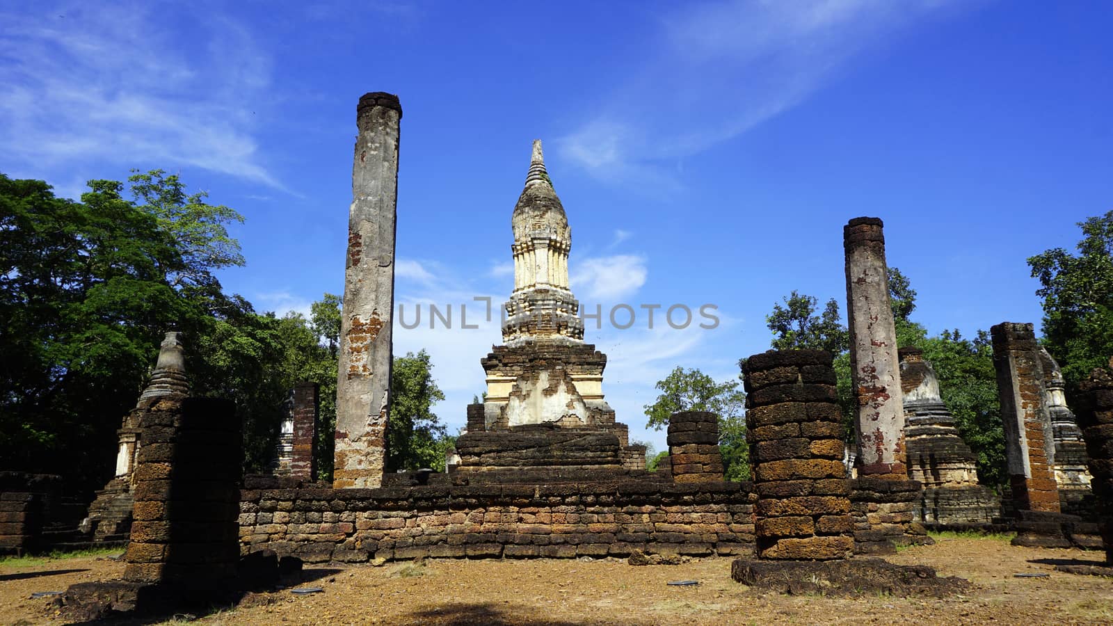 Historical Pagoda Wat chedi seven rows temple landscape in Sukhothai world heritage