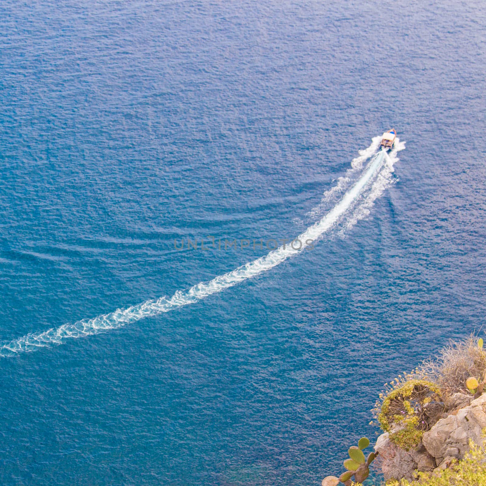 Speedboat cruising over tne sea by alanstix64