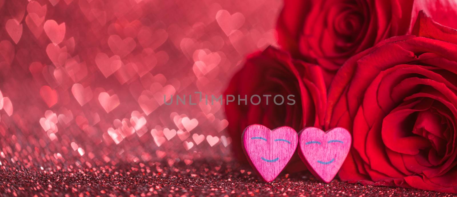 Roses and hearts on red glowing bokeh hearts background for Valentines day