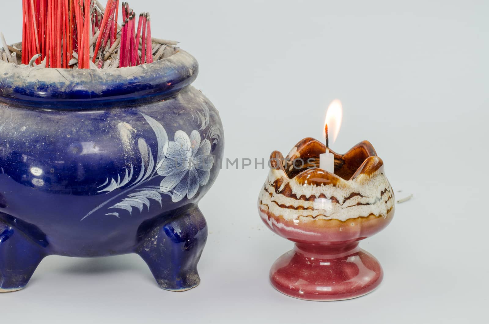 Incense burner and fire  on white background