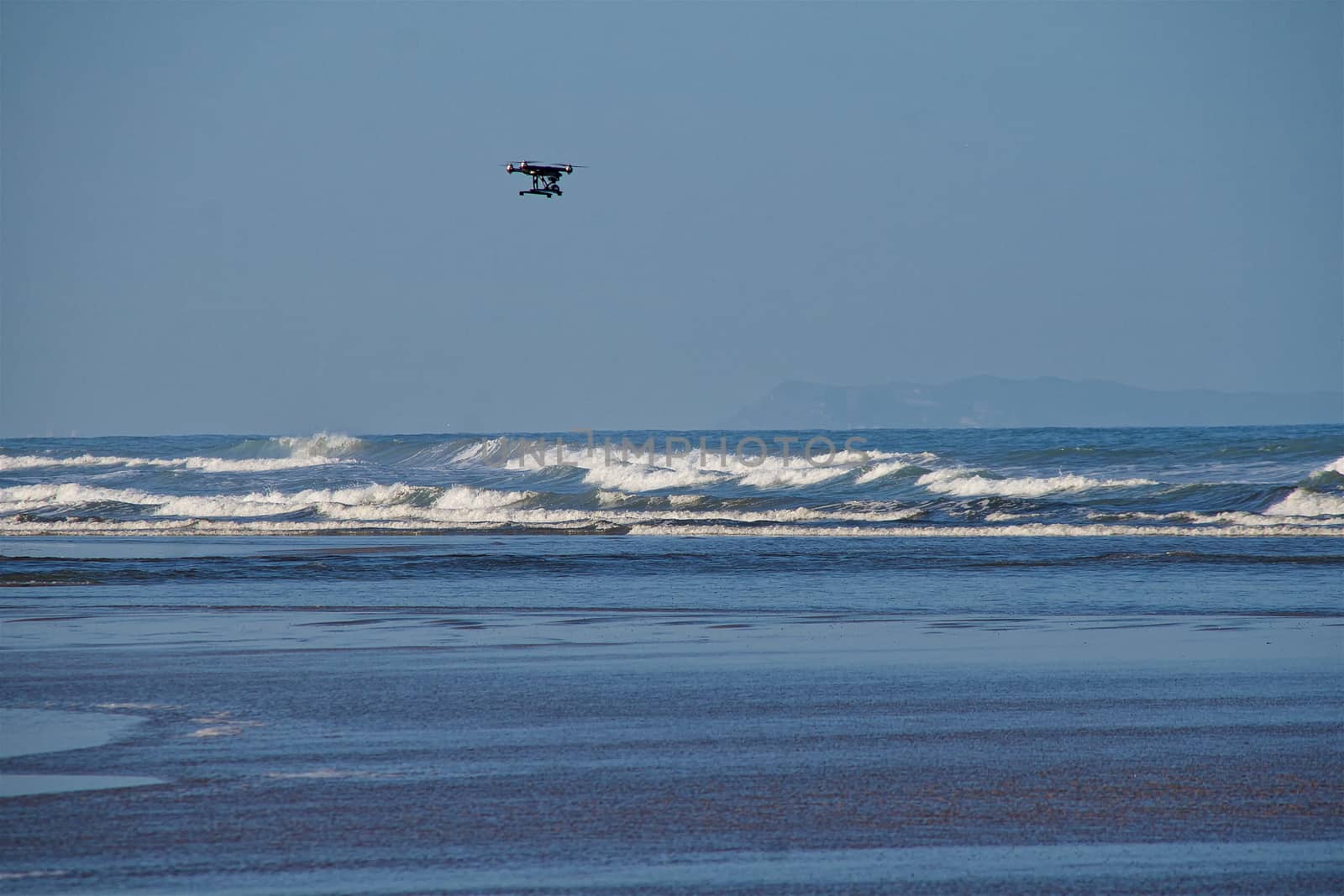 Sea and sky with a drone flying